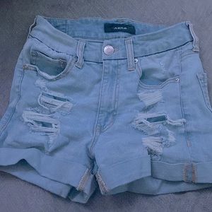 Light washed distressed denim shorts